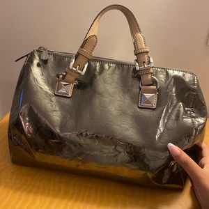 Rose gold metallic Michael kors bag